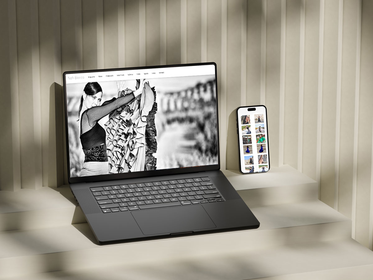 Das Bild zeigt einen Laptop und ein Handy mit der Website der Flamenco-Tänzerin Nati Blanco gestaltet von Strahlenkatzen Studio für Grafikdesign in Köln